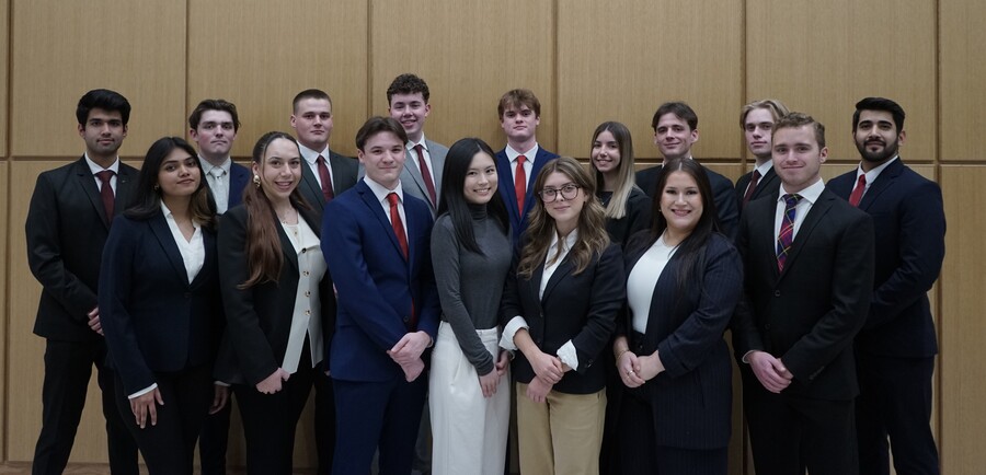 Research Associates standing for a group photo.