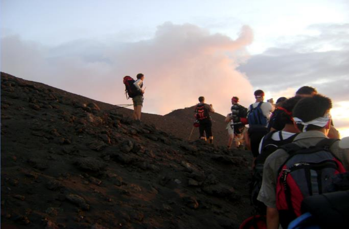 Geology students climbing towards the summit of Italy's Mount Stromboli.