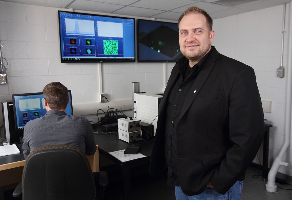 Dr. Jacob Hanley in the ore deposits research laboratory